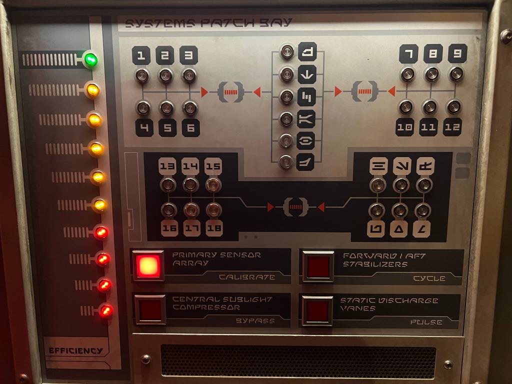 Systems Patch Bay: a grid of LEDs and buttons