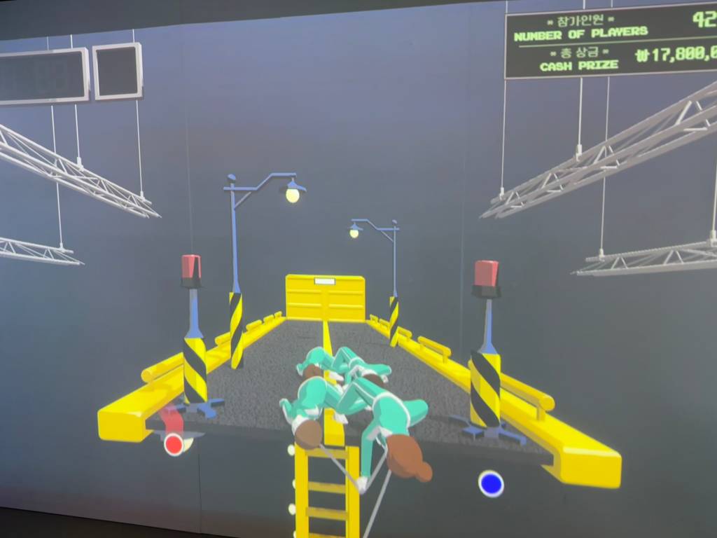 A group of four enemies is pulled over the edge of a platform into space below