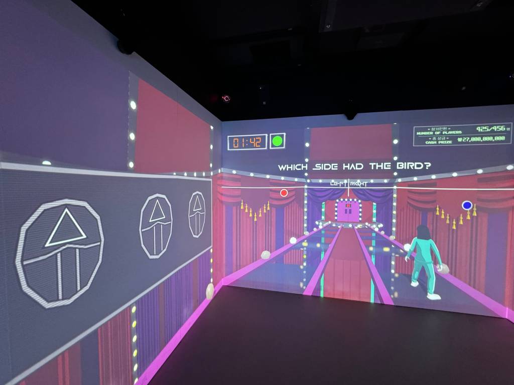 Three hidden symbols are shown on the left wall. The main wall says "Which side had the bird?"