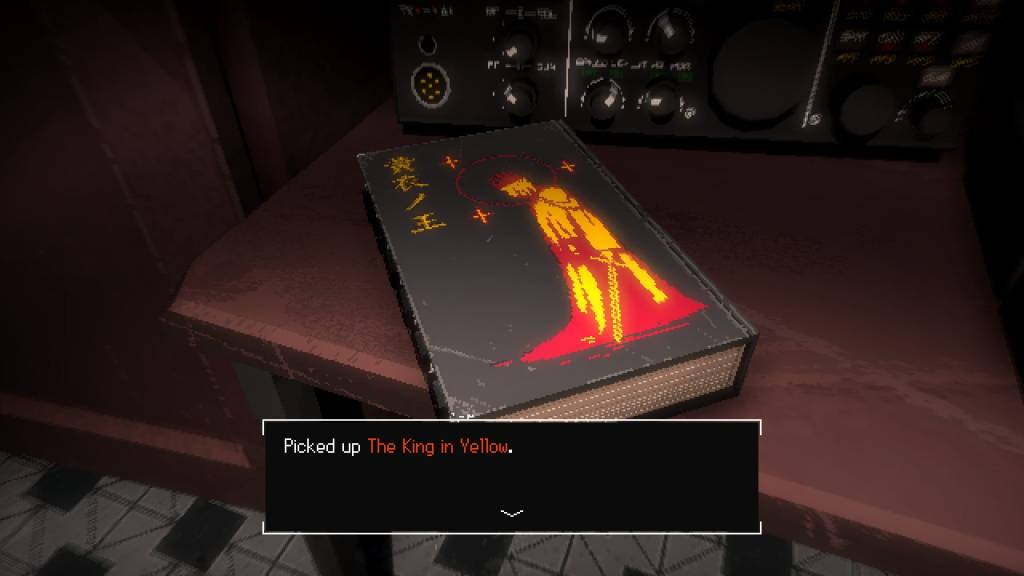 A book on a table, with the text "Picked up The King in Yellow"