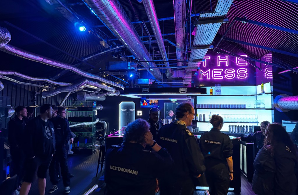 A futuristic bar with neon lights