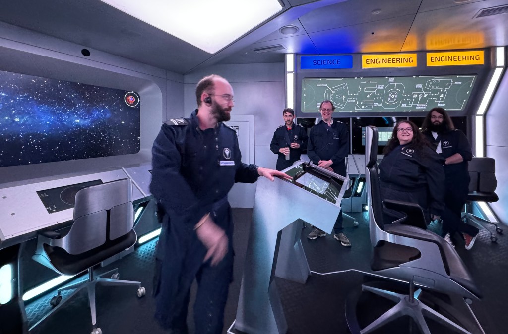 Our acting captain walking around the bridge as the crew watches