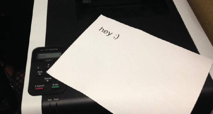 A printout that just says "hey ;)"