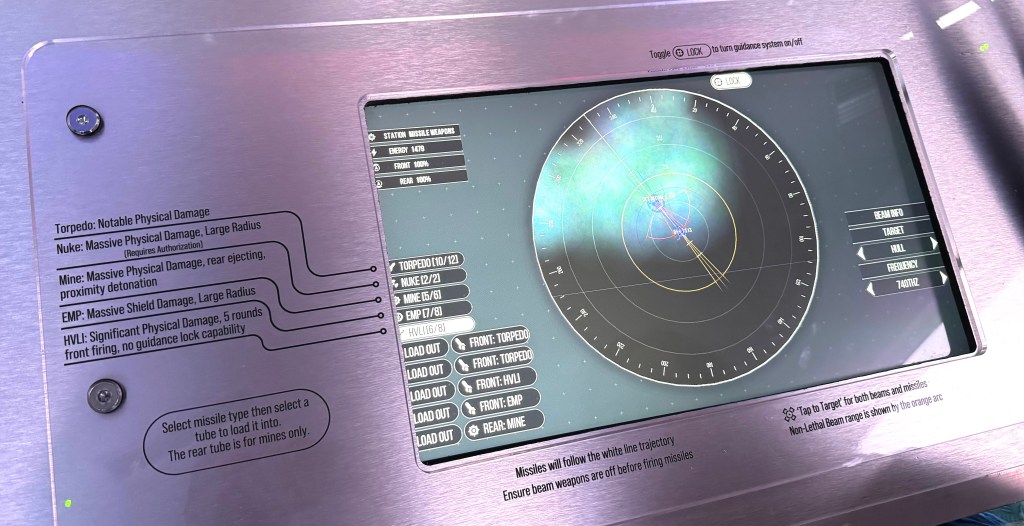 Decals printed next to a computer screen indicating the function of each button